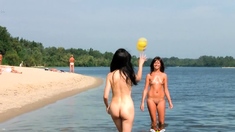 nudist teen enjoys a beautiful day at the beach