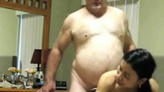 Chubby old guy fucks his slut