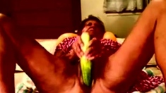 Granny amateur using a huge cucumber, cuming and squirting