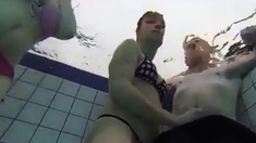 Teen Gives Handjob In Public Pool